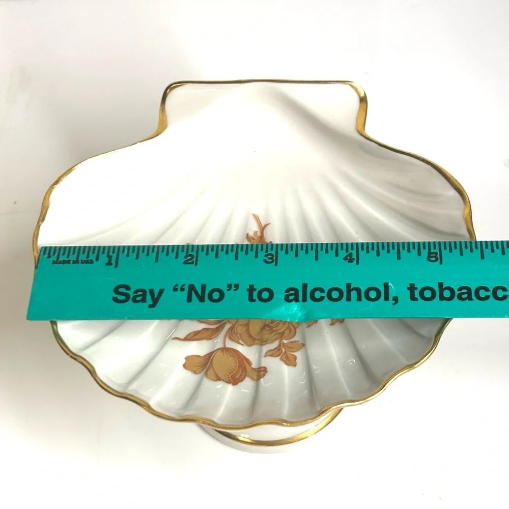 Vintage Limoges France porcelain shell-shaped pedestal dish.
